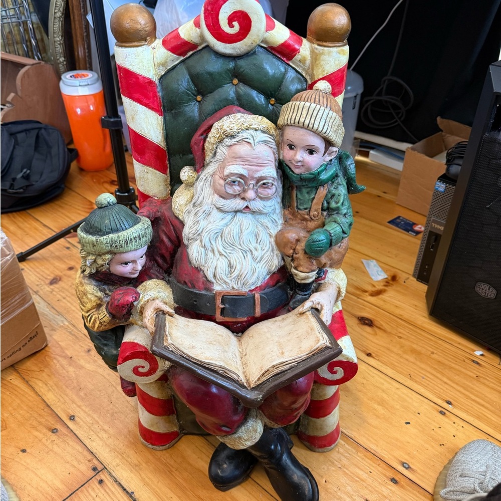 Festive Santa Claus and Children Holiday Figurine